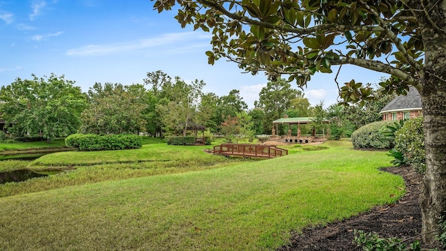12027 Water Oak Dr, Magnolia, TX 77354 - view of green lawn with a gazebo