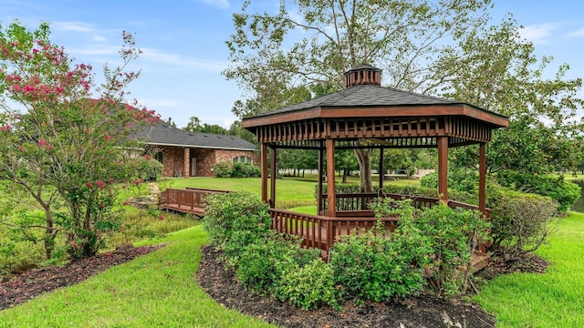 12027 Water Oak Dr, Magnolia, TX 77354 - surrounding community with a gazebo, a lawn, and a wooden deck