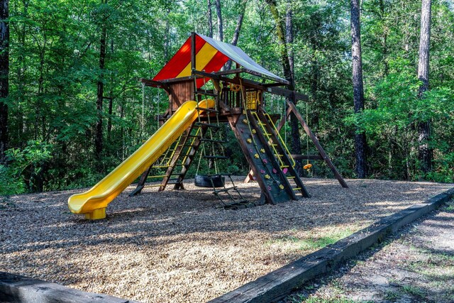 307 Grand Vw, Huntsville, TX 77340 - community play area with a view of trees