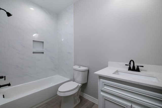 307 Grand Vw, Huntsville, TX 77340 - bathroom with vanity, toilet, shower / bath combination, baseboards, and wood finished floors