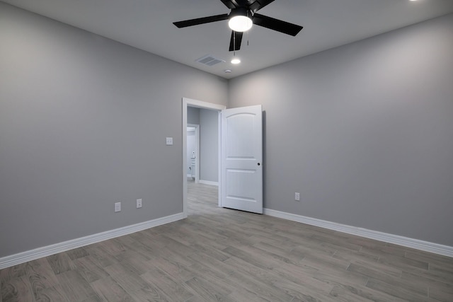 307 Grand Vw, Huntsville, TX 77340 - empty room featuring light wood-type flooring, ceiling fan, baseboards, and recessed lighting