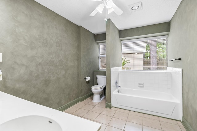3336 Thornwood Way, Huntsville, TX 77340 - full bathroom with a garden tub, toilet, tile patterned flooring, a sink, and baseboards