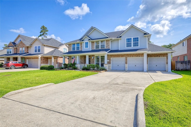 8210 Edenwood Dr, Spring, TX 77389 - view of front facade with driveway, a garage, covered porch, and stone siding