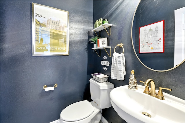 8210 Edenwood Dr, Spring, TX 77389 - half bathroom featuring a sink and toilet