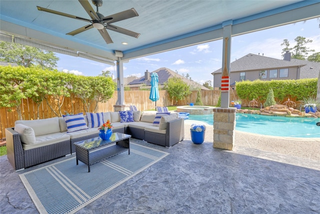 8210 Edenwood Dr, Spring, TX 77389 - fenced backyard with ceiling fan, outdoor lounge area, a patio area, and a pool with connected hot tub