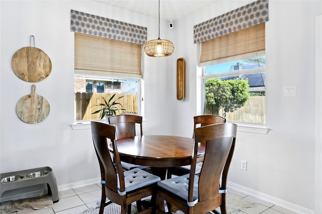 8210 Edenwood Dr, Spring, TX 77389 - dining area with baseboards and light tile patterned floors