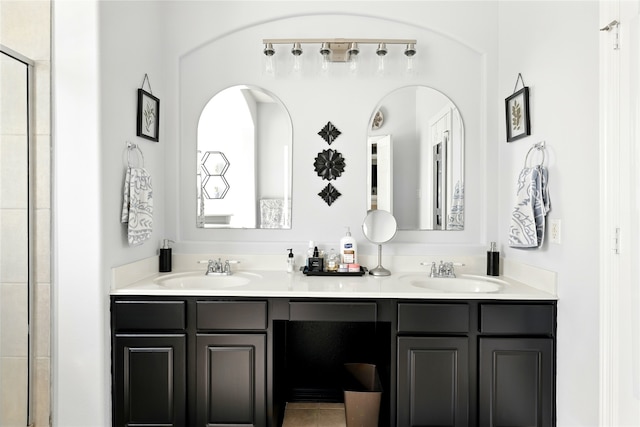 8210 Edenwood Dr, Spring, TX 77389 - bathroom featuring double vanity and a tile shower