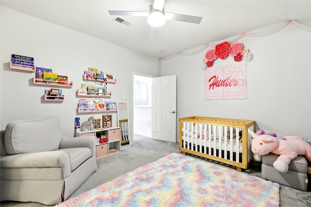 8210 Edenwood Dr, Spring, TX 77389 - carpeted bedroom featuring a nursery area and a ceiling fan