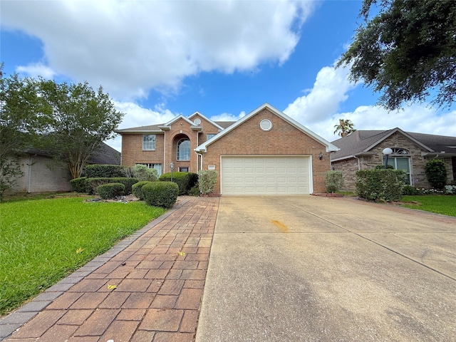 522 Chickory Field Ln, Pearland, TX 77584 - traditional home featuring brick siding, driveway, a front lawn, and a garage