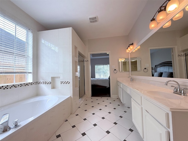 522 Chickory Field Ln, Pearland, TX 77584 - bathroom with connected bathroom, healthy amount of natural light, and double vanity
