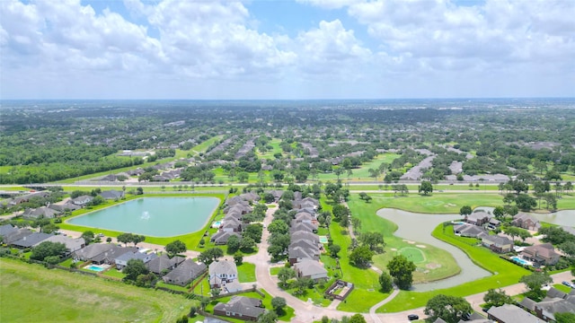522 Chickory Field Ln, Pearland, TX 77584 - aerial perspective of suburban area with a large body of water and a golf course