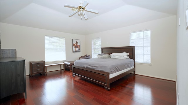 522 Chickory Field Ln, Pearland, TX 77584 - bedroom featuring multiple windows, dark wood-style floors, and baseboards