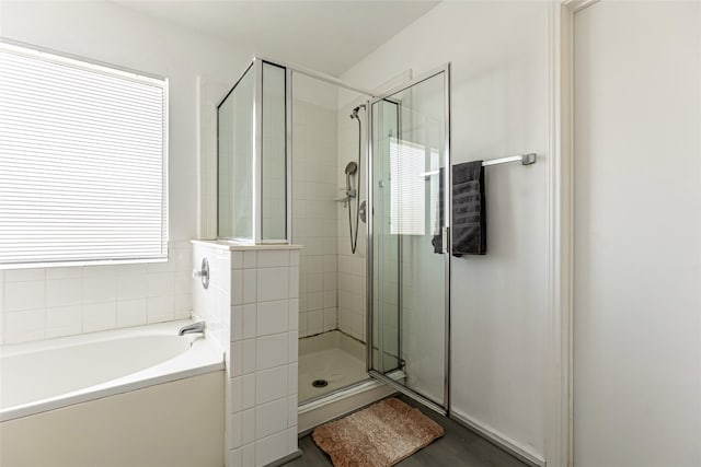 15135 Kamary Ln, San Antonio, TX 78247 - full bathroom featuring a stall shower and a garden tub