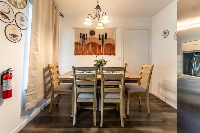 15135 Kamary Ln, San Antonio, TX 78247 - dining room with dark wood-type flooring, a chandelier, and baseboards
