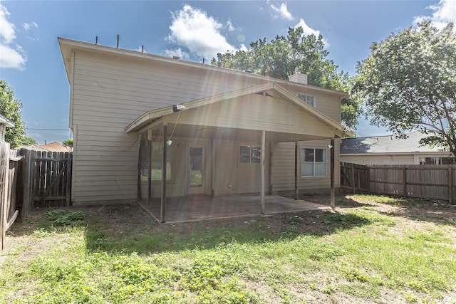 15135 Kamary Ln, San Antonio, TX 78247 - back of property featuring a patio and a chimney