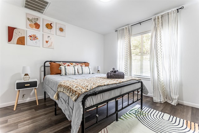 15135 Kamary Ln, San Antonio, TX 78247 - bedroom with baseboards and wood finished floors
