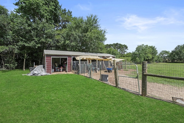31047 Torrey Rd, Waller, TX 77484 - view of yard featuring an outbuilding