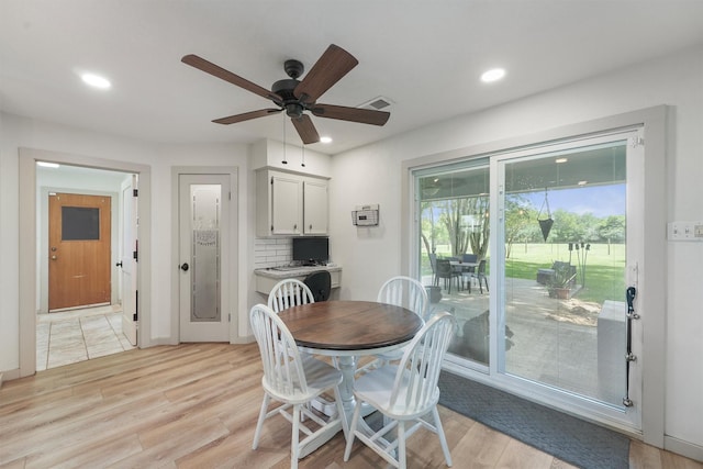 31047 Torrey Rd, Waller, TX 77484 - dining room featuring a ceiling fan, recessed lighting, light wood-style flooring, and baseboards