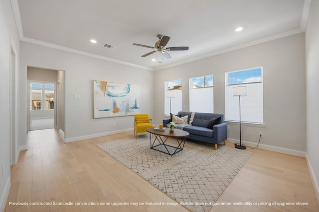 1818 Colquitt St, Houston, TX 77098 - living area with light wood-style flooring, ceiling fan, baseboards, recessed lighting, and ornamental molding