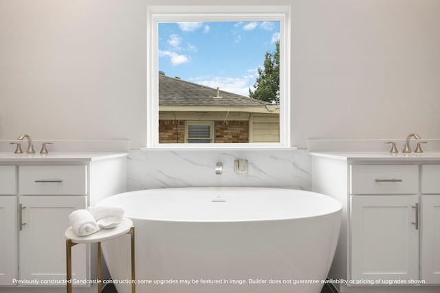 1818 Colquitt St, Houston, TX 77098 - bathroom featuring vanity and a freestanding tub