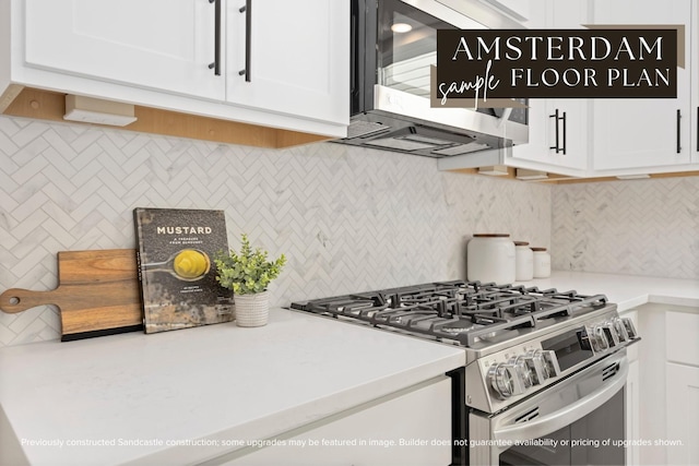 1818 Colquitt St, Houston, TX 77098 - kitchen featuring stainless steel appliances, decorative backsplash, white cabinets, and light countertops