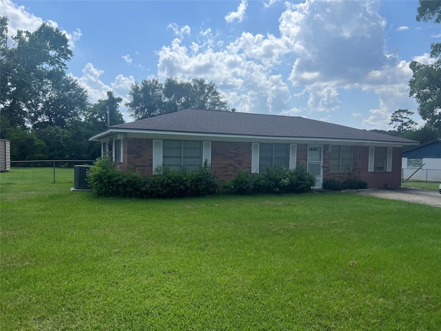 2991 Mimosa Ln, Huntsville, TX 77320 - ranch-style house featuring brick siding and central AC unit