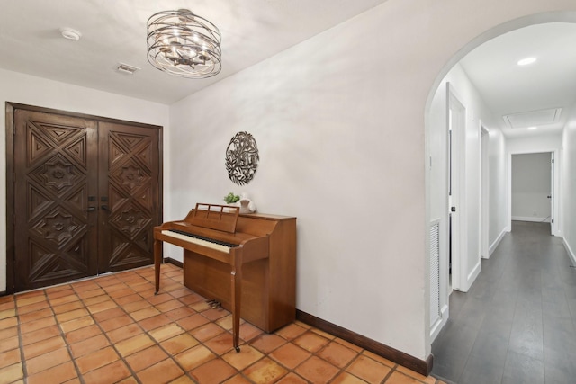 6222 Queensloch Dr, Houston, TX 77096 - entrance foyer with arched walkways, baseboards, and recessed lighting