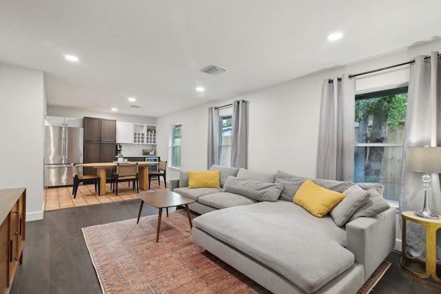 6222 Queensloch Dr, Houston, TX 77096 - living room with recessed lighting, dark wood finished floors, and baseboards