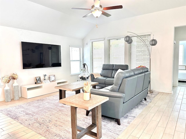 7419 Caprock Canyon Ln, Porter, TX 77365 - living area with plenty of natural light, a ceiling fan, lofted ceiling, light wood-style floors, and baseboards