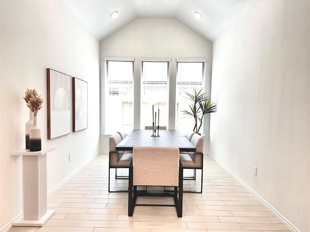7419 Caprock Canyon Ln, Porter, TX 77365 - dining room with vaulted ceiling and light wood-style floors