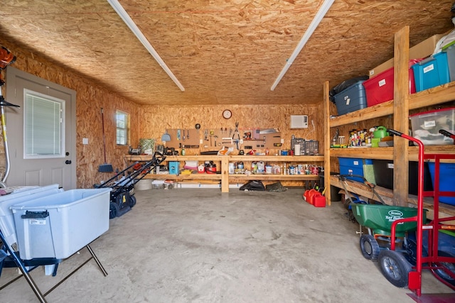 213 Cobb St, Corrigan, TX 75939 - garage featuring a workshop area