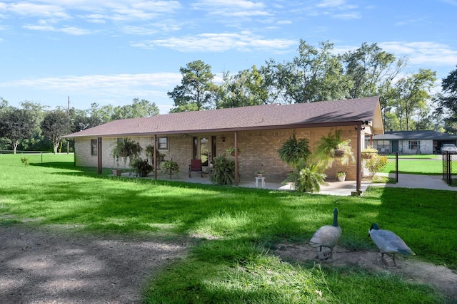 213 Cobb St, Corrigan, TX 75939 - ranch-style house with brick siding and roof with shingles
