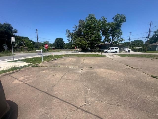 8008 De Priest St, Houston, TX 77088 - view of road with traffic signs