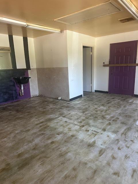 8008 De Priest St, Houston, TX 77088 - garage featuring a sink