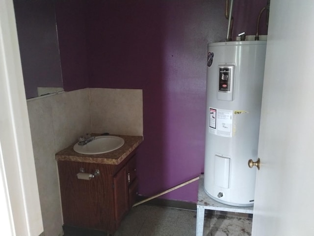 8008 De Priest St, Houston, TX 77088 - bathroom featuring water heater and vanity