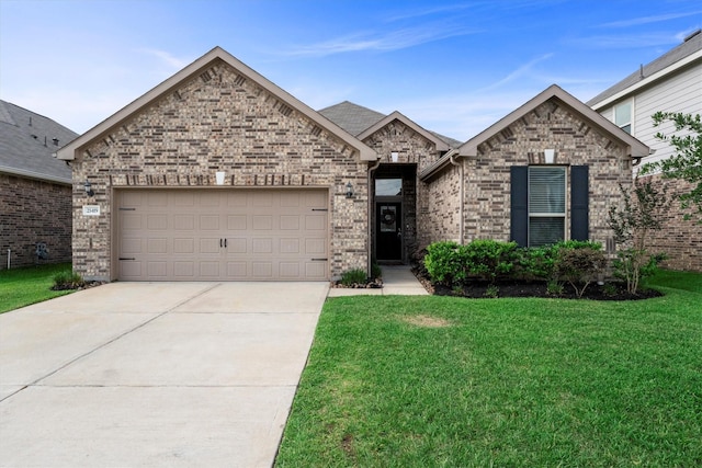 25419 Whitehaven Gate St, Katy, TX 77493 - view of front of home with a front lawn, concrete driveway, and an attached garage