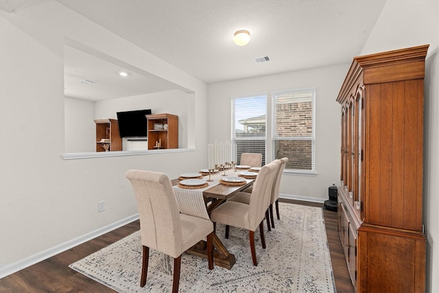 25419 Whitehaven Gate St, Katy, TX 77493 - dining space featuring dark wood-style flooring and baseboards