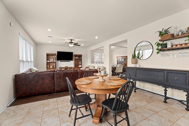 25419 Whitehaven Gate St, Katy, TX 77493 - dining room with a ceiling fan, recessed lighting, light tile patterned flooring, and a bar
