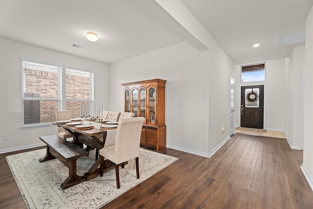 25419 Whitehaven Gate St, Katy, TX 77493 - dining area featuring dark wood-style flooring, baseboards, and attic access