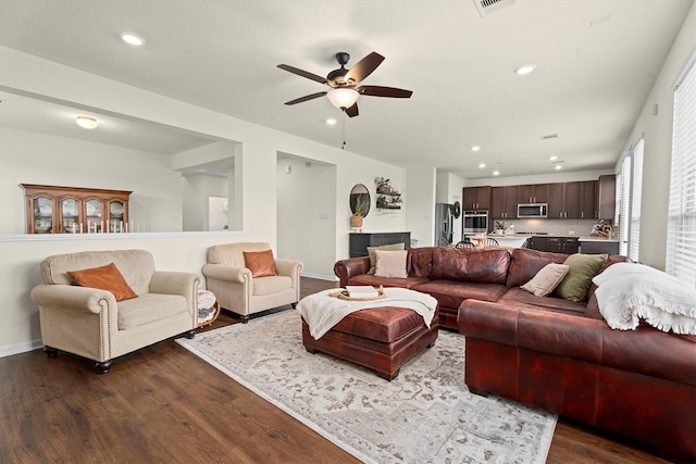 25419 Whitehaven Gate St, Katy, TX 77493 - living area with dark wood finished floors, a ceiling fan, recessed lighting, and baseboards