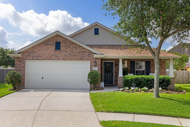 6103 Moran Crest Dr, Spring, TX 77388 - view of front of home featuring brick siding, concrete driveway, a garage, roof with shingles, and covered porch