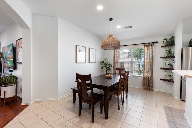 6103 Moran Crest Dr, Spring, TX 77388 - dining area featuring arched walkways, baseboards, and recessed lighting