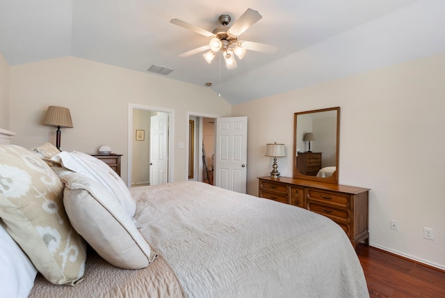 6103 Moran Crest Dr, Spring, TX 77388 - bedroom featuring lofted ceiling, dark wood-type flooring, baseboards, and ceiling fan