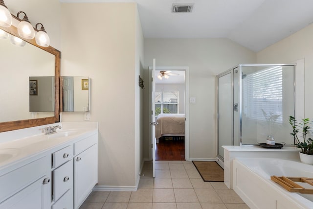 6103 Moran Crest Dr, Spring, TX 77388 - bathroom featuring a shower stall, a garden tub, double vanity, ensuite bath, and tile patterned flooring