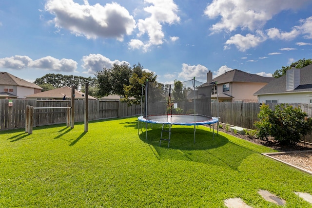 6103 Moran Crest Dr, Spring, TX 77388 - view of yard with a trampoline and a residential view