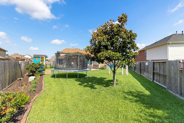 6103 Moran Crest Dr, Spring, TX 77388 - view of yard with a trampoline and a residential view