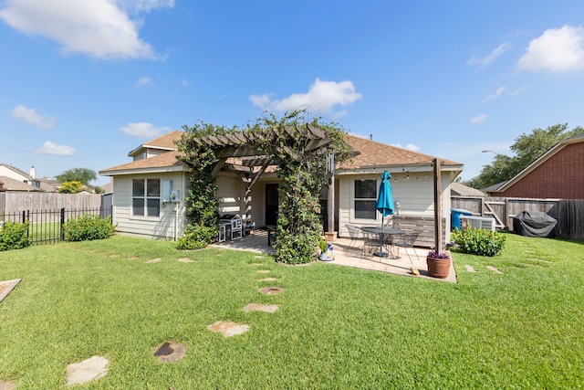 6103 Moran Crest Dr, Spring, TX 77388 - back of house featuring a patio area and a shingled roof