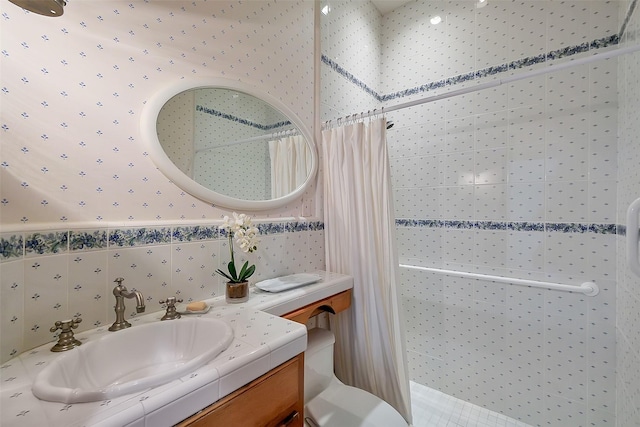 5318 Westerham St, Fulshear, TX 77441 - bathroom with wallpapered walls, vanity, a shower with curtain, and toilet