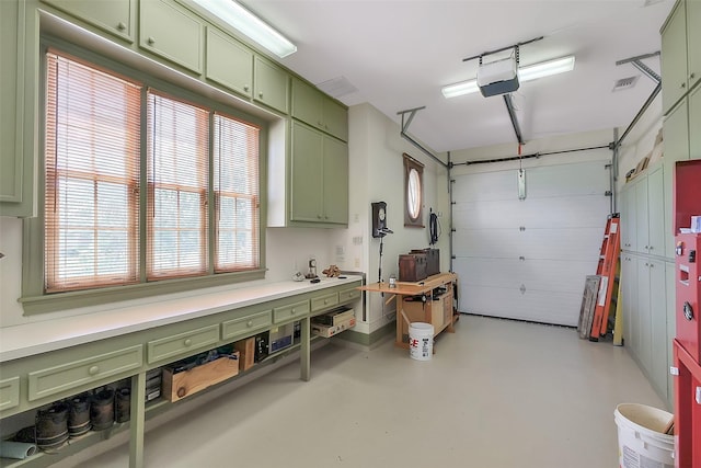 5318 Westerham St, Fulshear, TX 77441 - garage featuring a workshop area