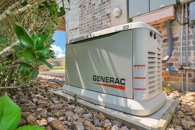 5318 Westerham St, Fulshear, TX 77441 - exterior view of a power unit, electric meter, and brick siding